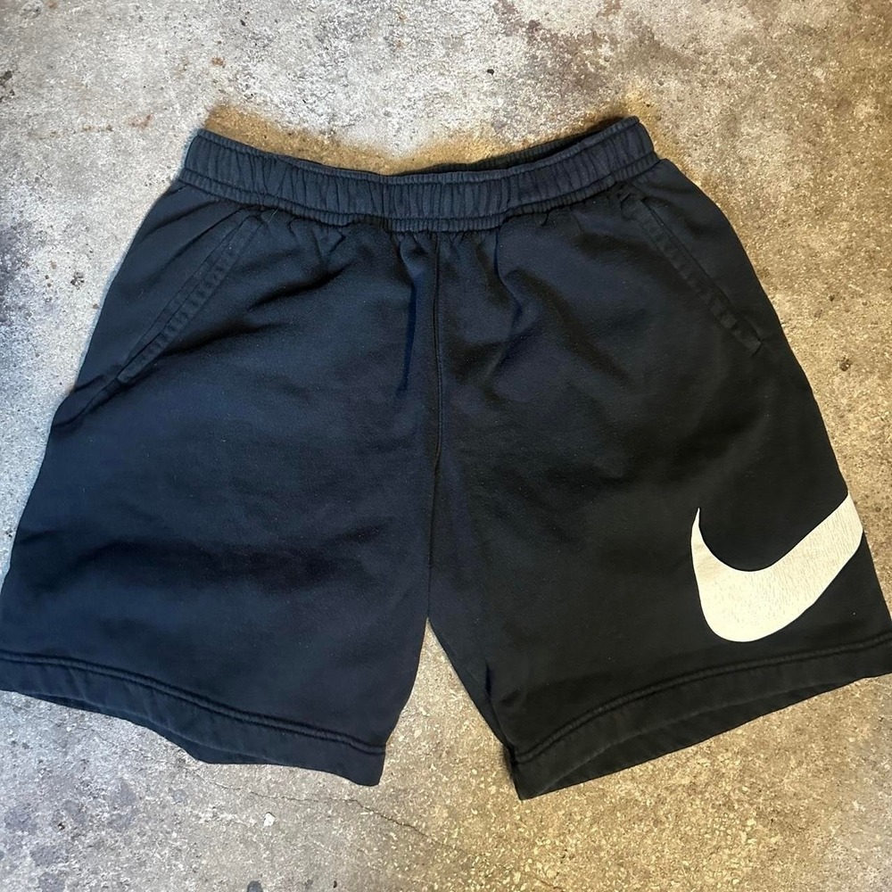 *SOLD* Nike black shorts with big side leg white swoosh Size S [28 waist]